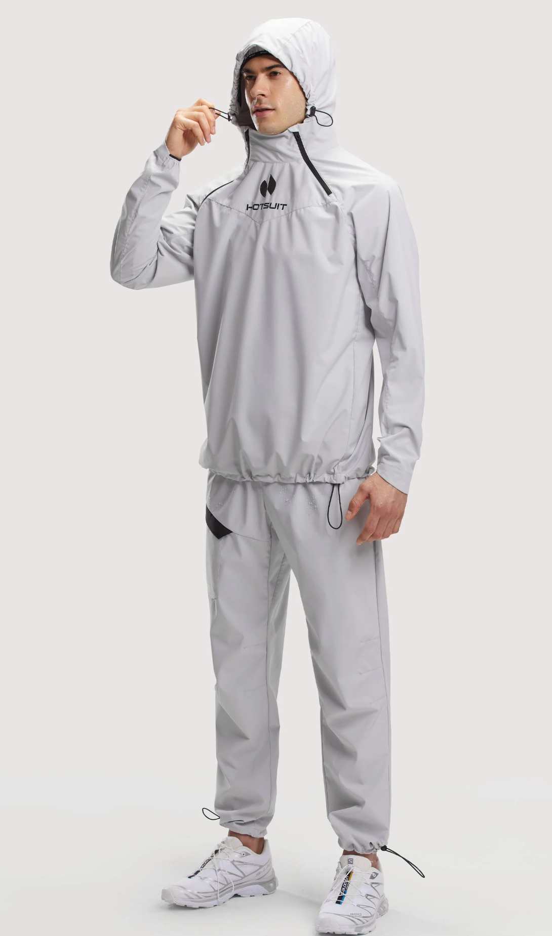 Athletic man in white Hotsuit sauna suit